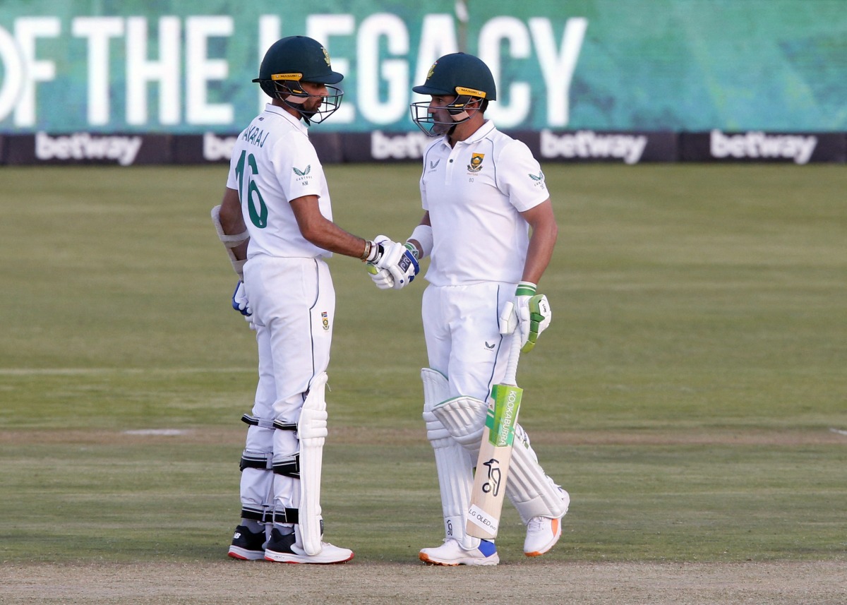 South Africa's Dean Elgar celebrates his half century with Keshav Maharaj REUTERS/Rogan Ward
