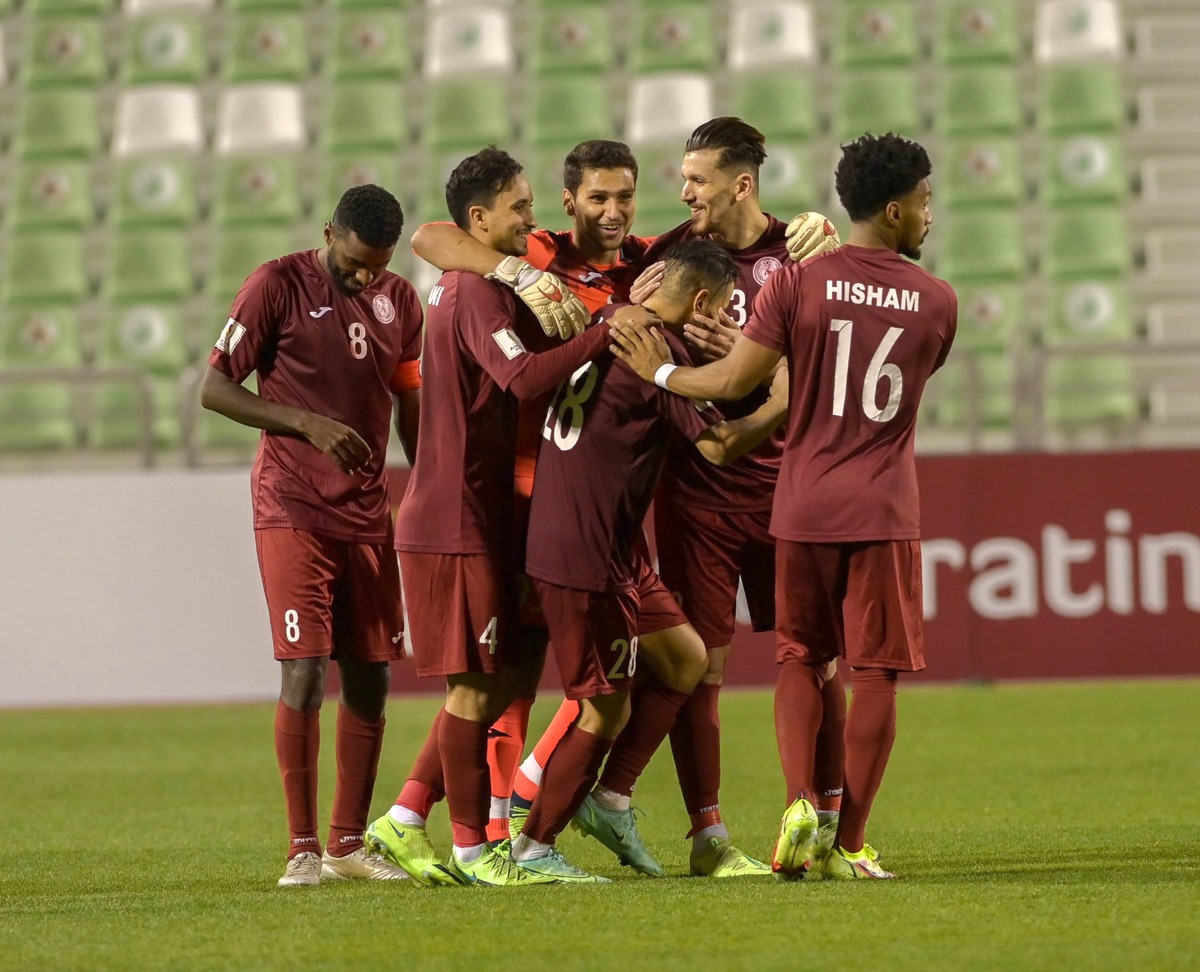 Al Markhiya players celebrate after defeating Mesaimeer SC.