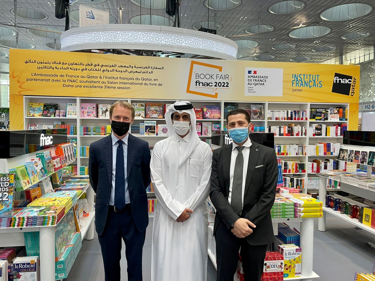 French Ambassador Jean-Baptiste Faivre and DIBF Director Jassim Al Bouenin at Embassy of France pavilion at the DIBF.