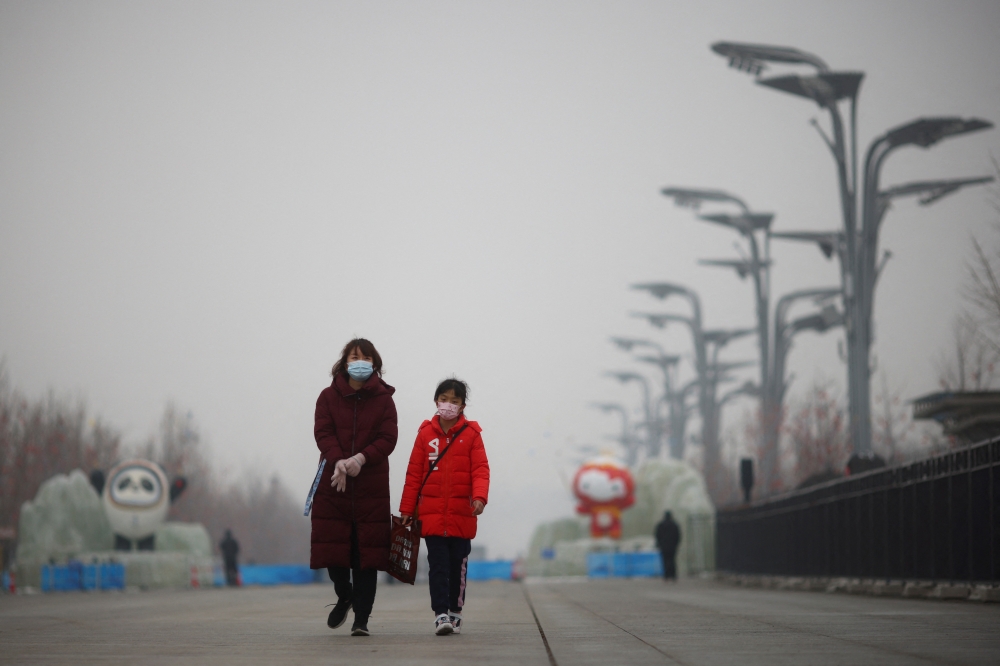 People walk near the closed loop 