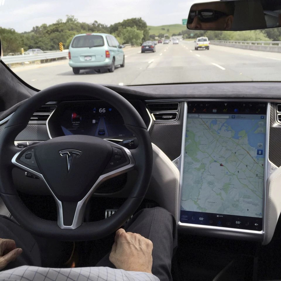 The interior of a Tesla Model S is shown in autopilot mode in San Francisco, California, U.S., April 7, 2016. REUTERS/Alexandria Sage/File Photo

