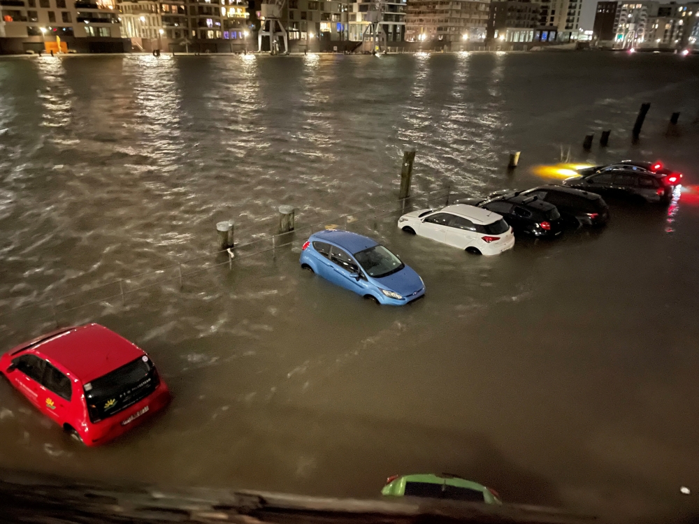 A flooded carpark is seen in Hamburg, Germany January 29, 2022, in this picture obtained from social media. Anna-Lena/via REUTERS