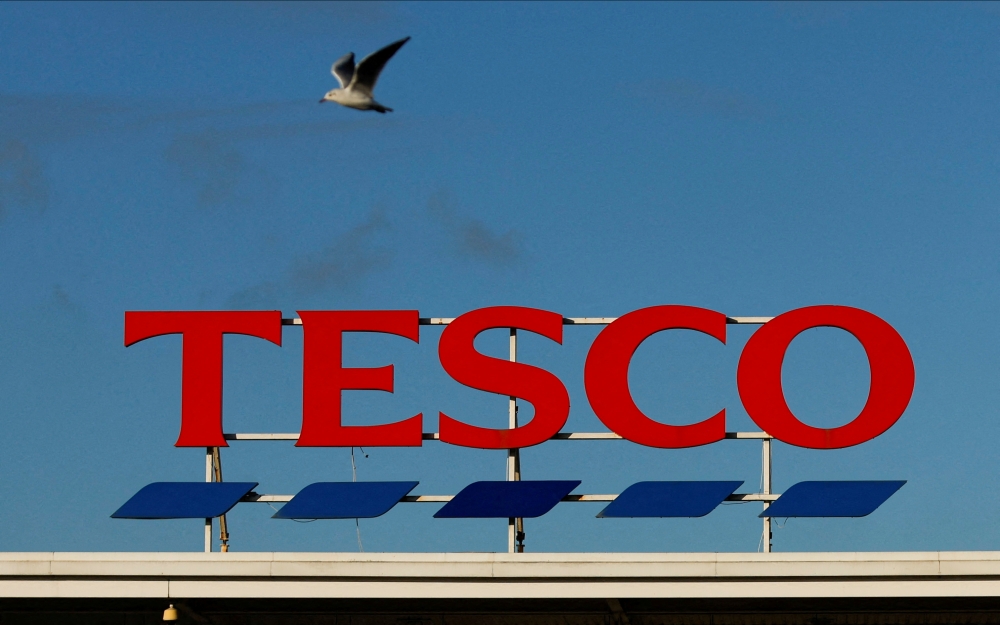 A general view of Tesco Extra store sign, in Warrington, Britain, January 13, 2022. REUTERS/Jason Cairnduff/File Photo