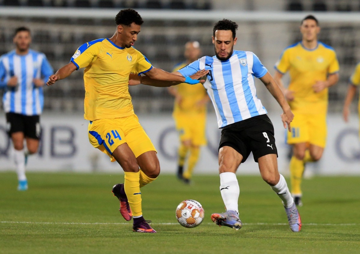 Action during the match between Al Wakrah and  Al Gharafa, yesterday.
