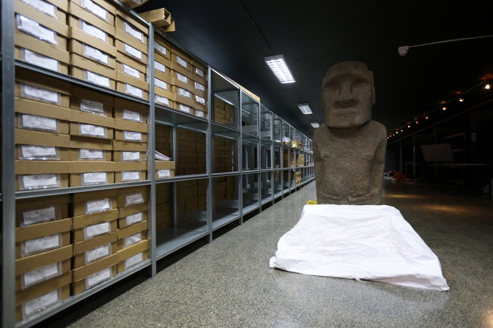 A Moai statue from Easter Island is displayed at the Natural History Museum before returning to the island, in Santiago, Chile, February 21, 2022. REUTERS/Ivan Alvarado
