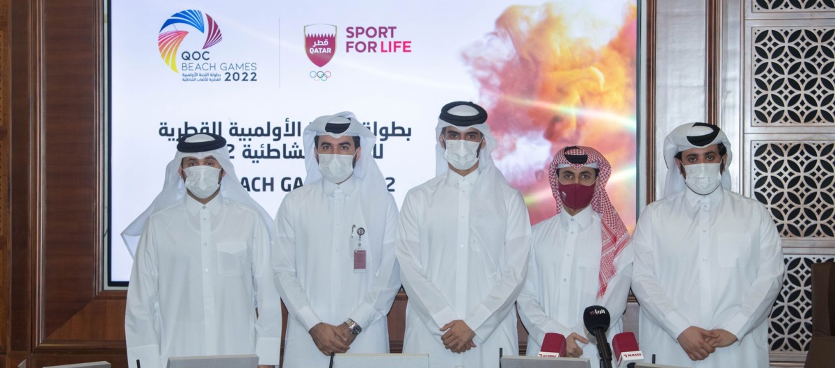 The officials of the 2022 QOC the Beach Games Organising committee pose for a photograph following a press conference, yesterday.