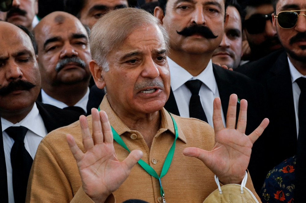 File photo: Leader of the opposition Mian Muhammad Shehbaz Sherif, brother of former Prime Minister Nawaz Sharif, gestures as he speaks to the media at the Supreme Court of Pakistan in Islamabad, Pakistan April 7, 2022. Reuters/Akhtar Soomro/File Photo