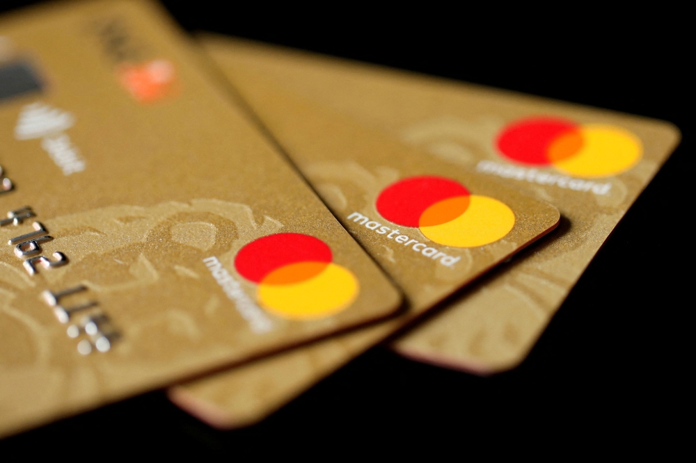 Mastercard Inc. credit cards are displayed in this picture illustration taken December 8, 2017. REUTERS/Benoit Tessier/Illustration/File Photo/File Photo