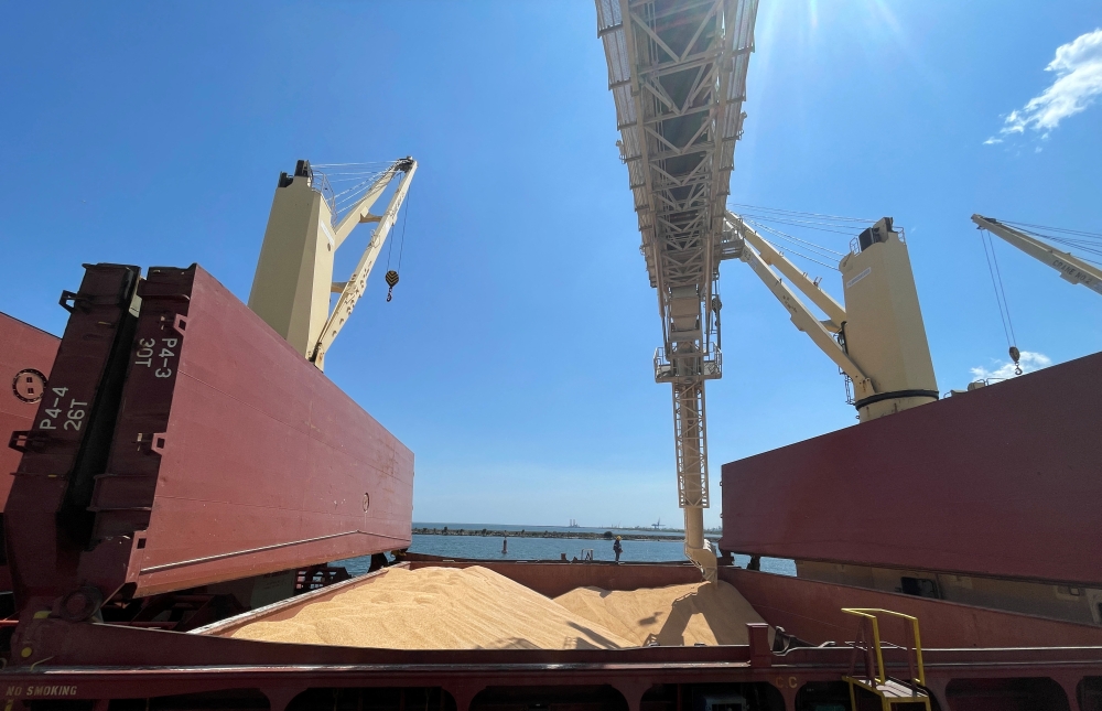 Grains are being loaded into a special transport cargo bound for Egypt, in the Black Sea port of Constanta, Romania, May 11, 2022. Picture taken May 11, 2022. REUTERS/Olimpiu Gheorghiu