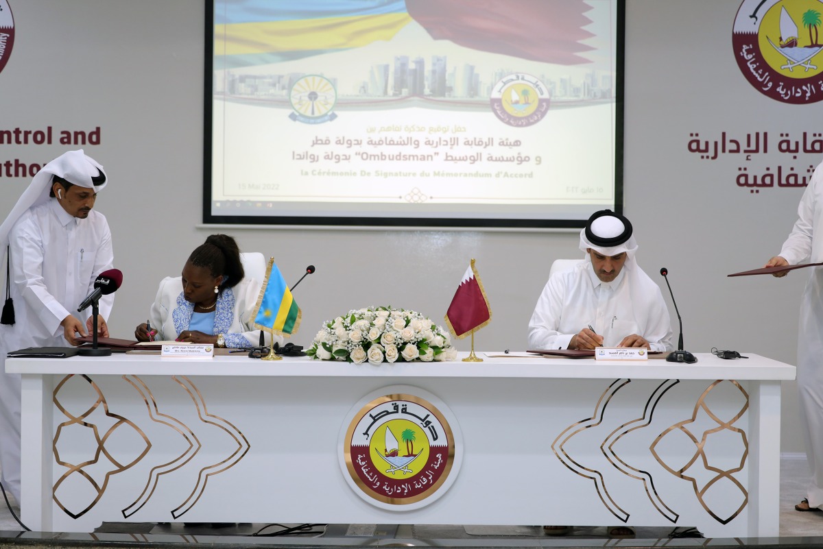 President of the Administrative Control and Transparency Authority H E Hamad bin Nasser Al Misnad and  President of the Office of the Ombudsman of Rwanda H E Nirere Madeleine signing the MoU in Doha, yesterday.
