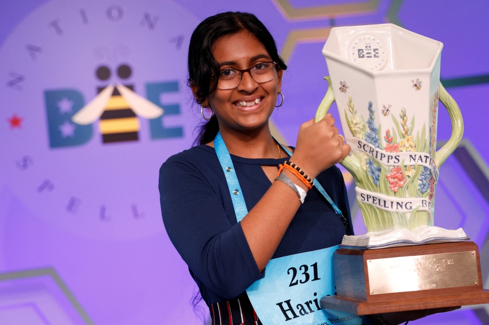 Harini Logan, 14, from San Antonio, Texas, holds the trophy after winning the annual Scripps National Spelling Bee held at National Harbor in Oxon Hill, Maryland, U.S., June 2, 2022. Reuters/Jonathan Ernst