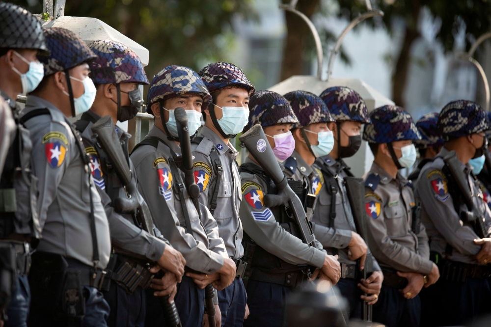 Police stand guard as they wait for protests against coup in Yangon, Myanmar February 4, 2021. REUTERS/Stringer/File Photo