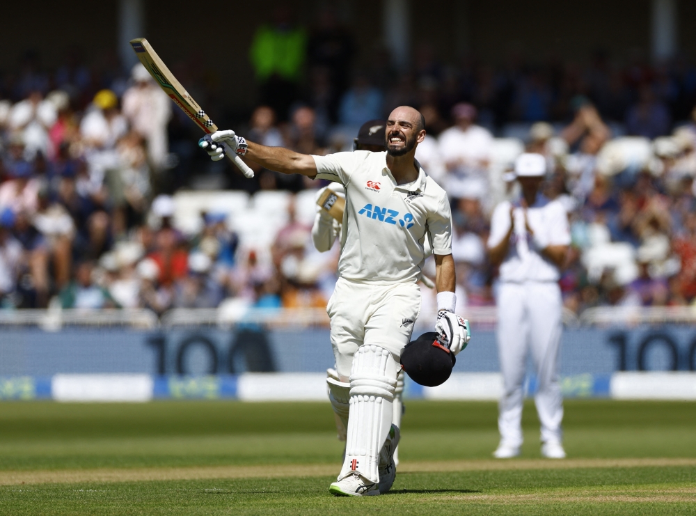 New Zealand's Daryl Mitchell celebrates reaching his century Action Images via Reuters/Andrew Boyers