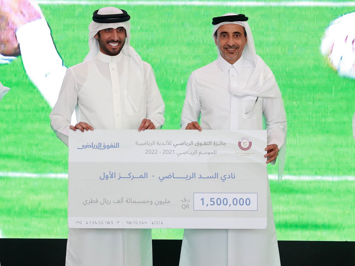 Minister of Sports and Youth H E Salah bin Ghanem Al Ali with Al Sadd CEO Turki Al Ali after the club won the Sports Excellence Award for the 2021-22 season.