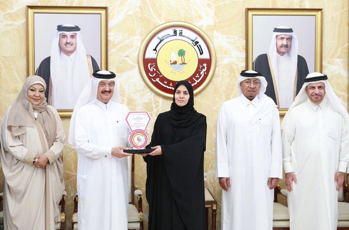 Deputy Speaker of Shura Council H E Dr. Hamda bint Hassan Al Sulaiti receiving the Medal of Arab Woman for Social Responsibility for the year 2022 from Dr. Mohammad bin Saif Al Kuwari, International Ambassador for Social Responsibility.