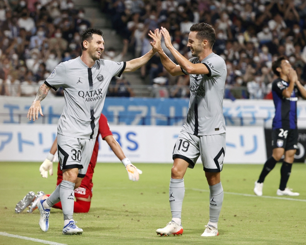Soccer Football - Pre Season Friendly - Gamba Osaka v Paris Saint-Germain - Suita Stadium, Osaka, Japan - July 25, 2022. Paris St Germain's Lionel Messi celebrates scoring their fourth goal. Mandatory credit Kyodo via REUTERS ATTENTION EDITORS - THIS IMAGE WAS PROVIDED BY A THIRD PARTY. 