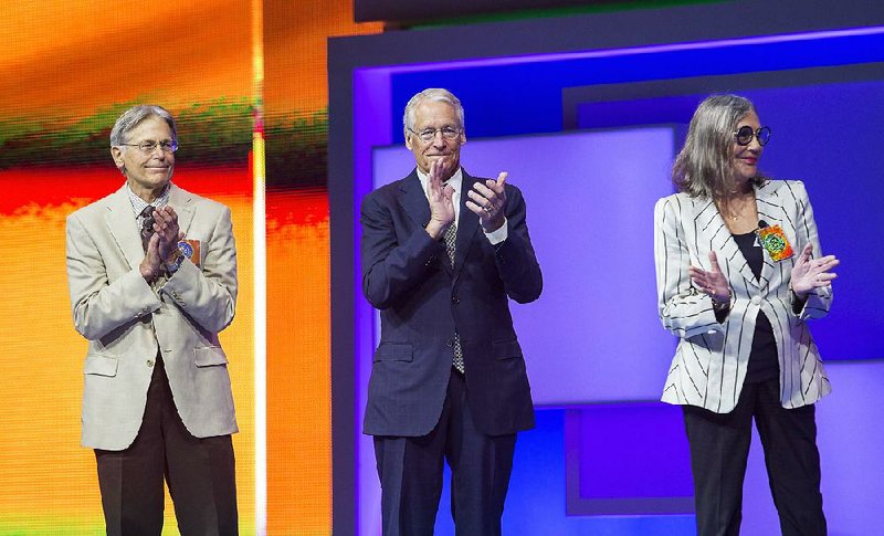File Photo: Walton family members Jim, Rob and Alice Walton at the 2015 Wal-Mart annual meeting in Fayetteville, Arkansas. (REUTERS/Rick Wilking)