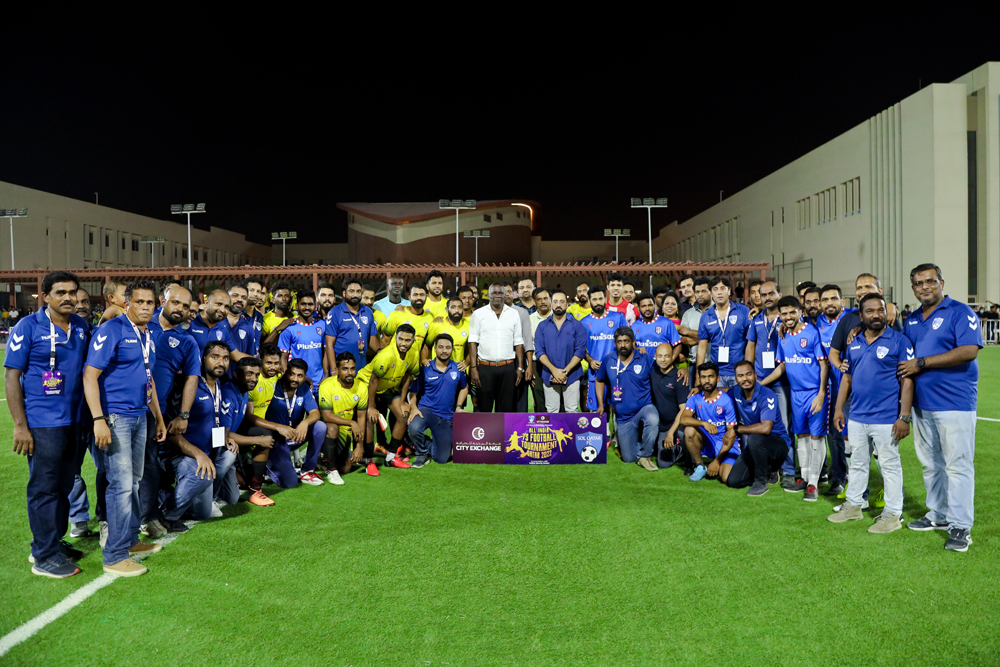 Football players with the officials.