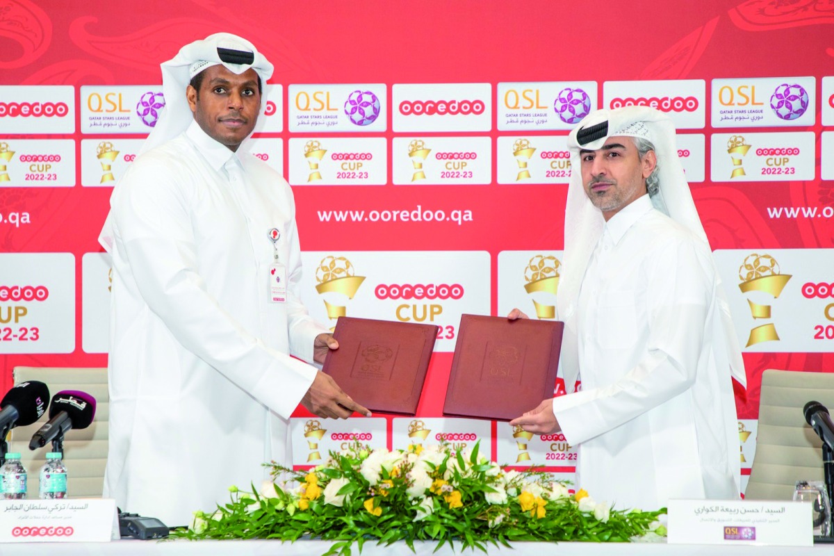 Ooredoo and QSL officials during the ceremony. 