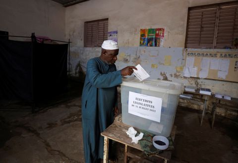 A man casts his ballot during the parliamentary election, in Pikine, on the outskirts of Dakar, Senegal, July 31, 2022. REUTERS/Zohra Bensemra