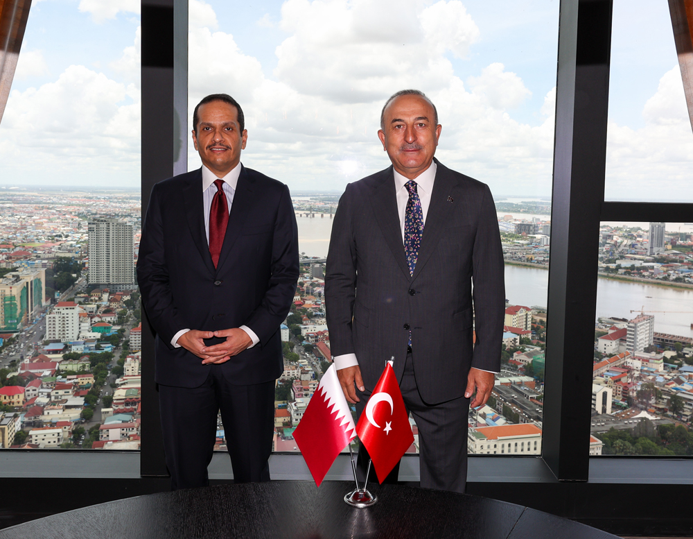 Deputy Prime Minister and Minister of Foreign Affairs H E Sheikh Mohammed bin Abdulrahman Al Thani with Minister of Foreign Affairs of Turkey H E Mevlut Cavusoglu, in Phnom Penh, Cambodia.
