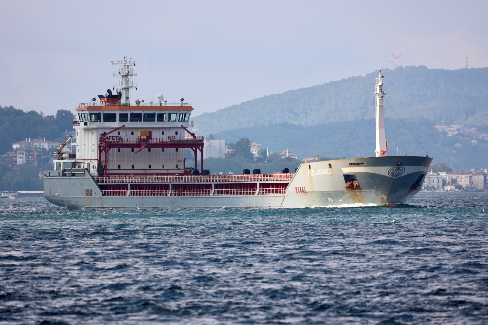 Turkish-flagged cargo ship Polarnet, carrying Ukrainian grain, sails in the Bosphorus, in Istanbul, Turkey, August 7, 2022. (REUTERS/Yoruk Isik)