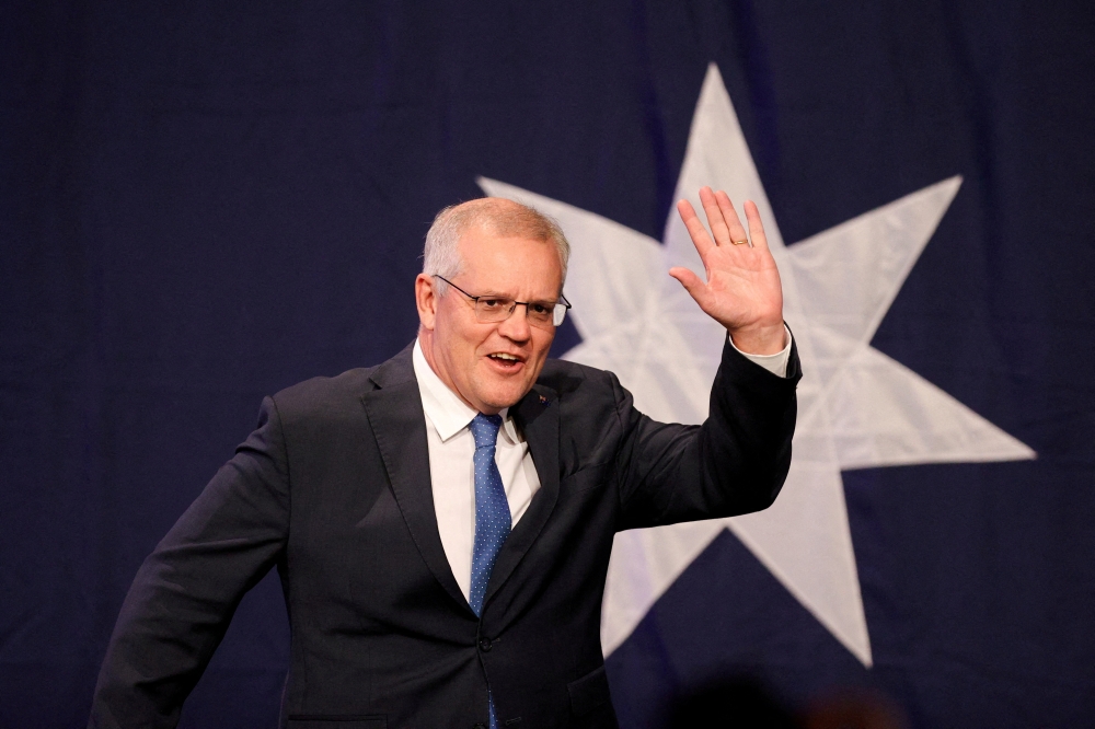 Scott Morrison, leader of the Australian Liberal Party, arrives to address supporters in Sydney, Australia, May 21, 2022. REUTERS/Loren Elliott//File Photo