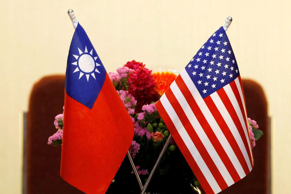 File Photo: Flags of Taiwan and US are placed for a meeting in Taipei, Taiwan, on March 27, 2018. (REUTERS/Tyrone Siu)

