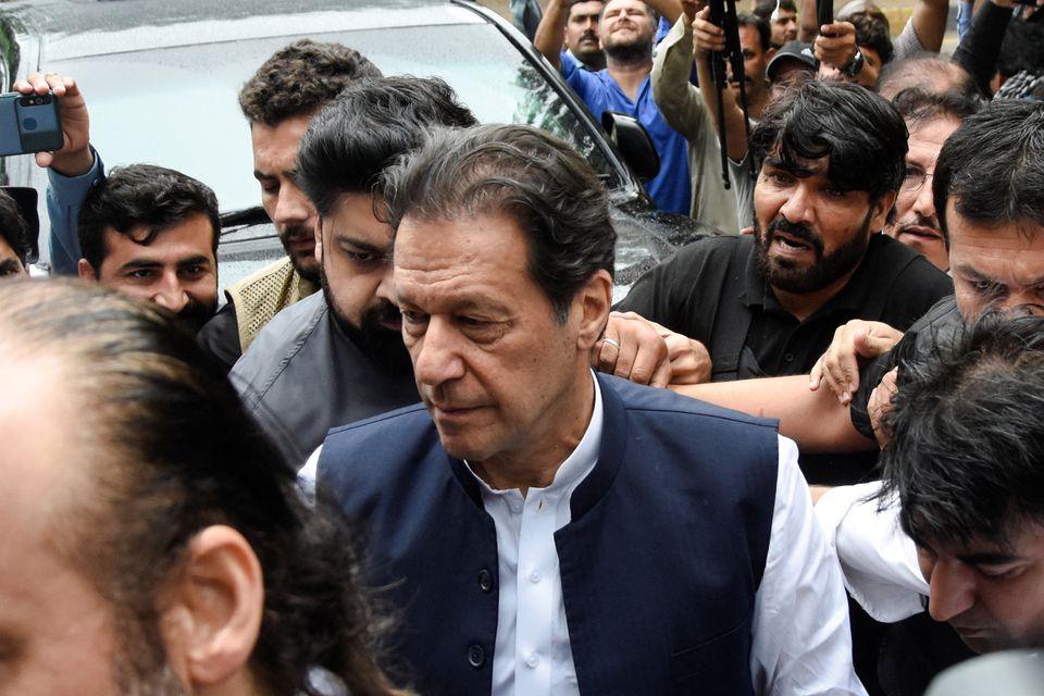 Pakistan's former Prime Minister Imran Khan, who is facing terrorism charges, appears in court to extend pre-arrest bail, in Islamabad, Pakistan, on August 25, 2022. REUTERS/Waseem Khan/File Photo