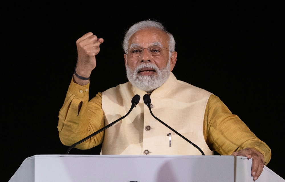 Prime Minister Narendra Modi gestures as he addresses a gathering after inaugurating a revamped colonial avenue in New Delhi, India, September 8, 2022. (REUTERS/Adnan Abidi)