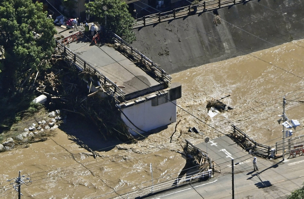 A damaged bridge by a typhoon is seen in Hamamatsu, Shizuoka Prefecture, Japan in this photo taken by Kyodo on September 24, 2022. Kyodo/via Reuters