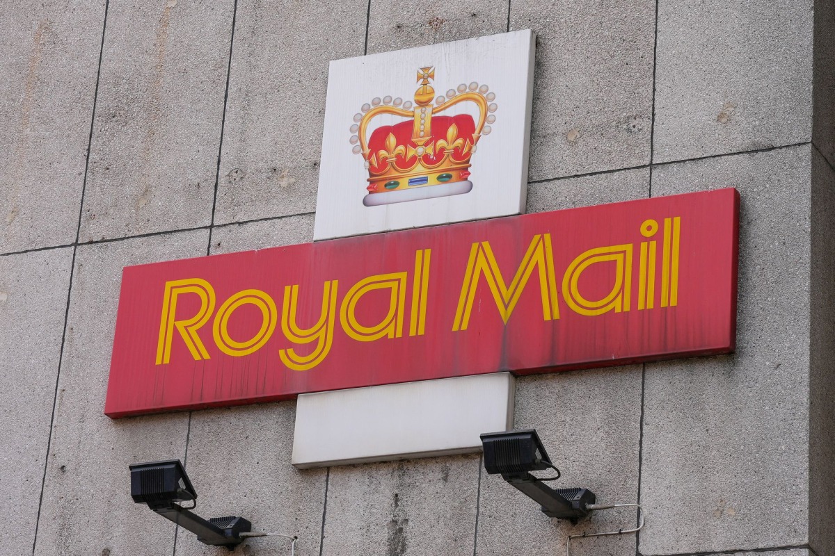 A Royal Mail sign is pictured outside a post delivery office, in London, Britain August 26, 2022.  File Photo / Reuters
