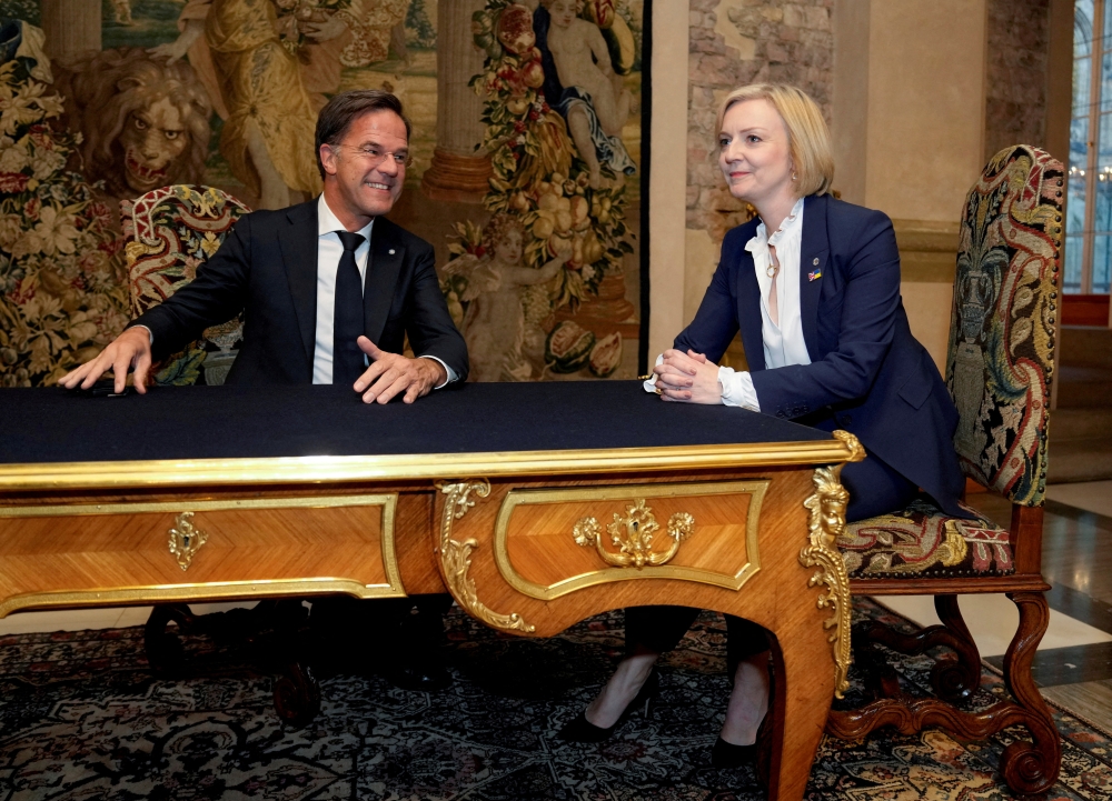 British Prime Minister Liz Truss speaks with the Prime Minister of the Netherlands Mark Rutte during a meeting on the sidelines of the European Political Community meeting at Prague Castle in Prague, Czech Republic, on October 6, 2022. Alastair Grant/Pool via REUTERS