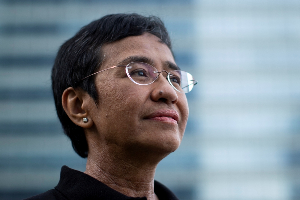 Filipino journalist and Rappler CEO Maria Ressa, one of 2021 Nobel Peace Prize winners, poses for a portrait in Taguig City, Metro Manila, Philippines, October 9, 2021. REUTERS/Eloisa Lopez/File Photo