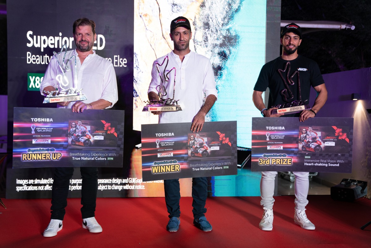 Qatar's Saeed Al Sulaiti (centre) with Italian Saska Totaro and Aref Al Marzooqi of the UAE after the presentation ceremony.
