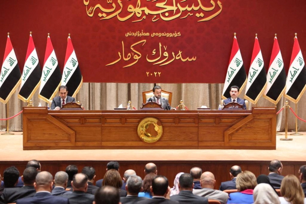 Iraqi lawmakers attend a parliamentary session to vote for a new head of state president in Baghdad, Iraq, on October 13, 2022. Iraqi Parliament Media Office/Handout via REUTERS
