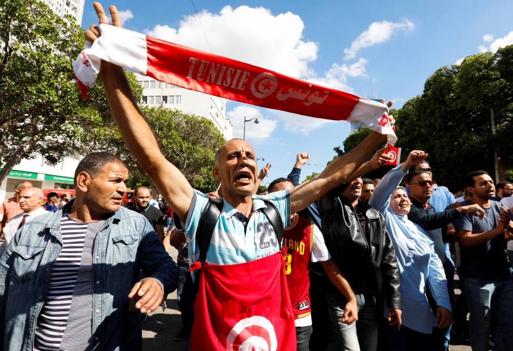Supporters of Tunisia's Islamist opposition party Ennahda attend a protest against Tunisian President Kais Saied, in Tunis, Tunisia October 15, 2022. REUTERS/Zoubeir Souissi