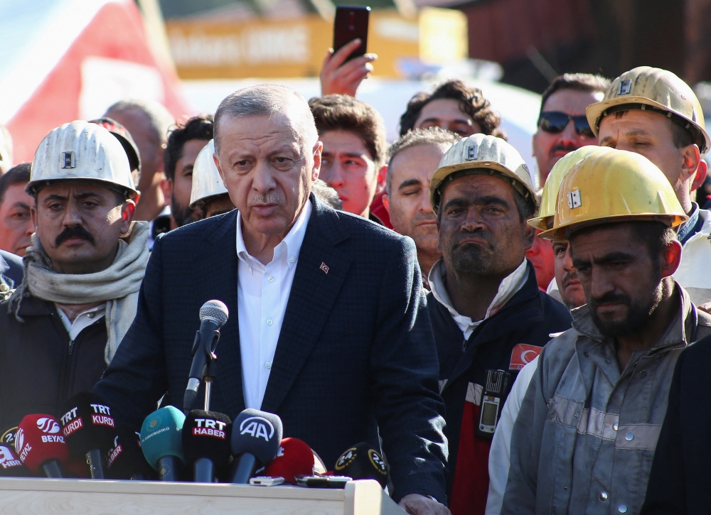 Turkish President Tayyip Erdogan talks to media as he visits the coal mine after an explosion in Amasra, in the northern Bartin province, Turkey, on October 15, 2022. REUTERS/Cagla Gurdogan