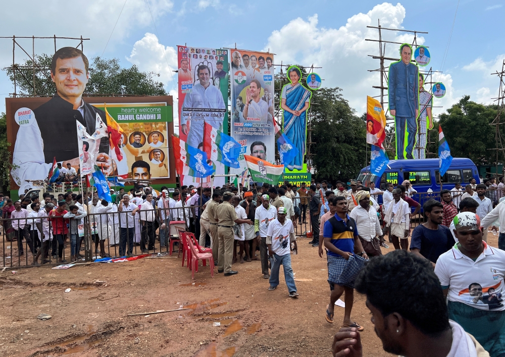 Police frisk supporters of India's main opposition Congress party as they arrive to attend a rally addressed by the party's leader Rahul Gandhi during his ongoing Bharat Jodo Yatra (Unite India March) in Ballari in the state of Karnataka, India, on October 15, 2022. REUTERS/Manoj Kumar