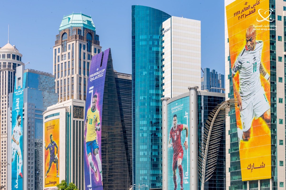 Various towers and buildings in West Bay are decorated with World Cup 2022 teams’ key players.