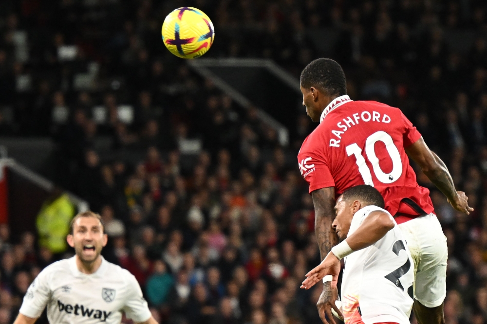 Manchester United's English striker Marcus Rashford heads home the only goal of the English Premier League football match between Manchester United and West Ham United at Old Trafford in Manchester, north-west England, on October 30, 2022.  (Photo by Oli SCARFF / AFP) 