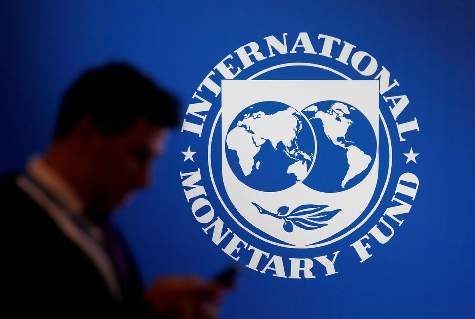 A participant stands near a logo of IMF at the International Monetary Fund - World Bank Annual Meeting 2018 in Nusa Dua, Bali, Indonesia, on October 12, 2018. File Photo / Reuters