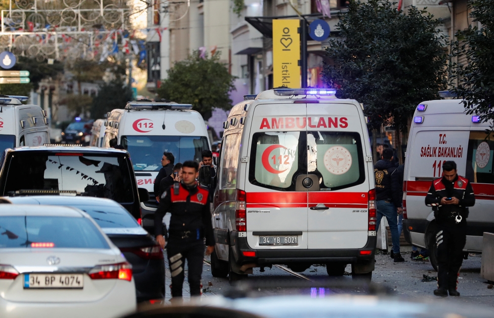 Bodies of unidentified people lay on the ground after an explosion on busy pedestrian Istiklal street in Istanbul, Turkey, November 13, 2022. REUTERS/Kemal Aslan