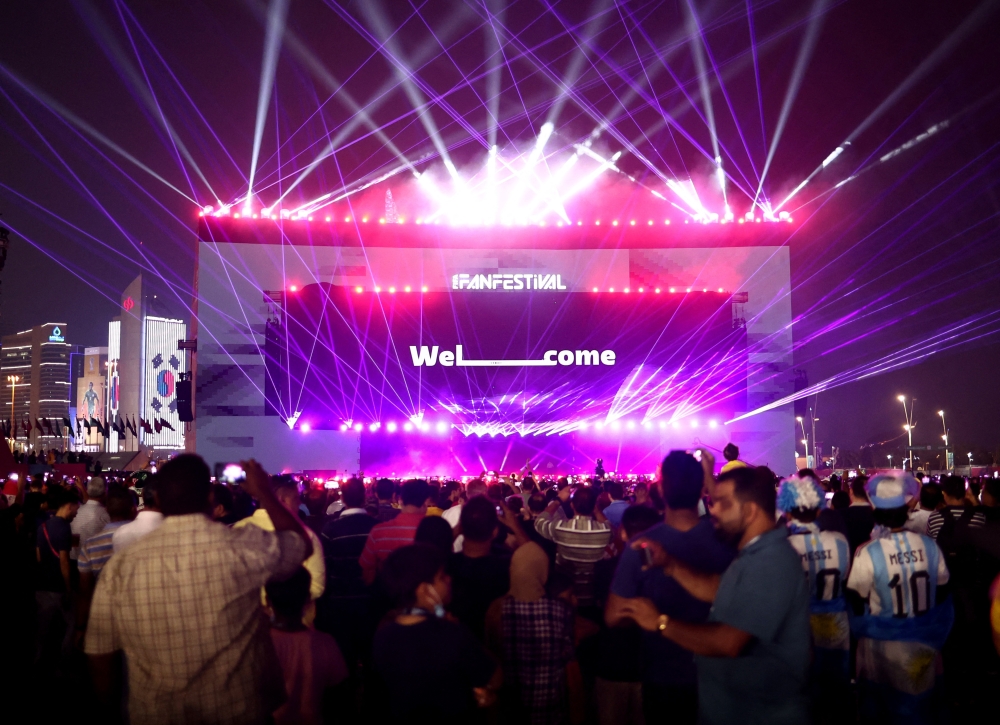 November 19, 2022 General view of fans at a stage during the opening of the FIFA fan festival REUTERS/Marko Djurica