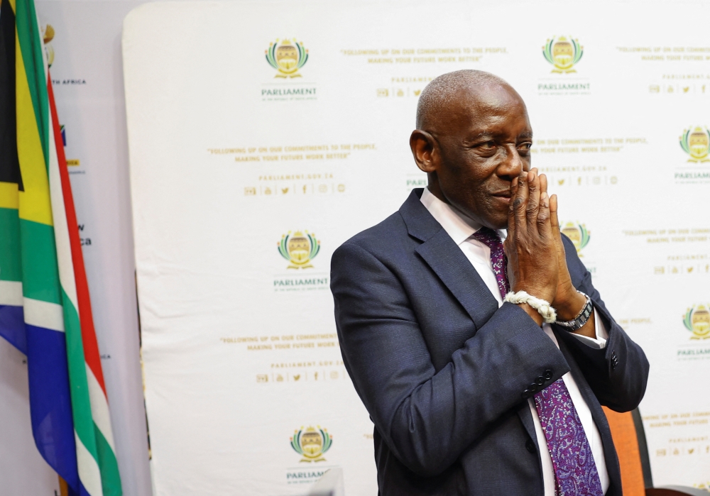 South Africa's former Chief Justice Sandile Ngcobo gestures ahead of the handing over of the report on whether or not President Cyril Ramaphosa should face an impeachment inquiry over the Phala Phala saga in Cape Town, South Africa, on November 30, 2022. REUTERS/Esa Alexander
 