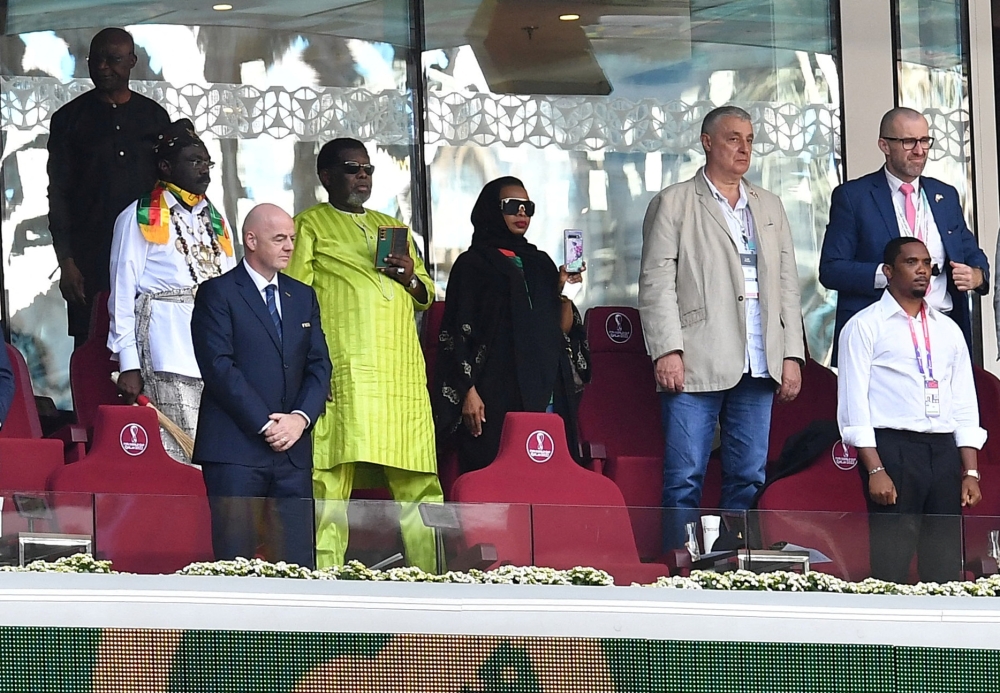 FIFA president Gianni Infantino and Cameroonian Football Federation President Samuel Eto'o are pictured in the stands before the FIFA World Cup Qatar 2022 Group G match between Cameroon and Serbia at the Al Janoub Stadium, Al Wakrah, Qatar, on November 28, 2022. REUTERS/Jennifer Lorenzini