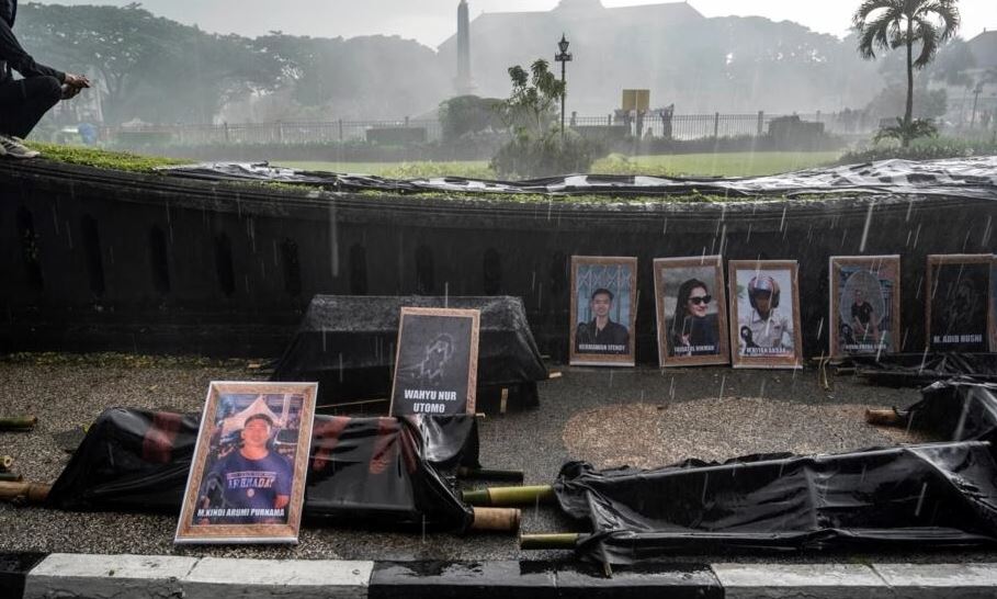 The stampede in the Javan city of Malang in October left 135 people dead, including more than 40 children. (Juni Kriswanto / AFP)
