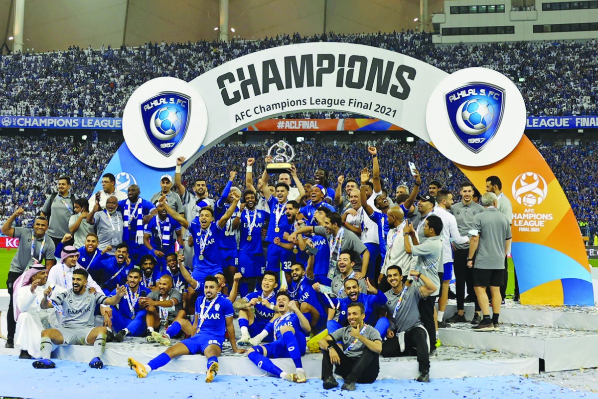 Al Hilal's players celebrate with the trophy after winning the AFC Champions League final in this file photo.
