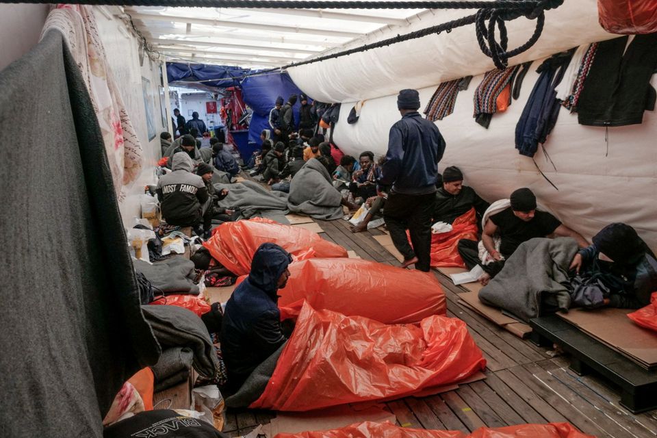 Migrants sleep on deck of NGO rescue ship 'Ocean Viking', in the Mediterranean Sea, on November 6, 2022. File Photo / Reuters
