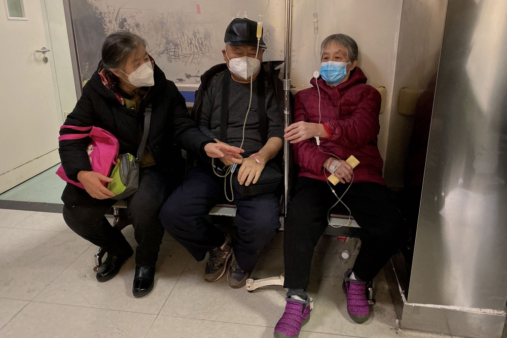 This picture shows Covid-19 patients being treated at Tianjin First Center Hospital in Tianjin on December 28, 2022. (Photo by Noel Celis / AFP)